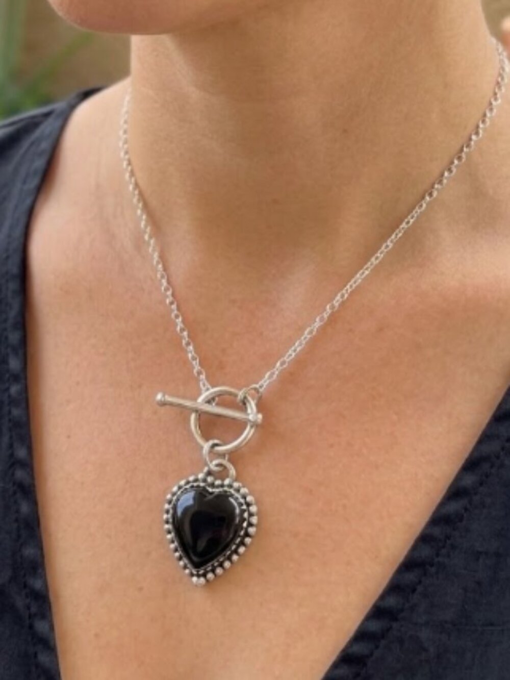 Sterling silver and black onyx heart pendant